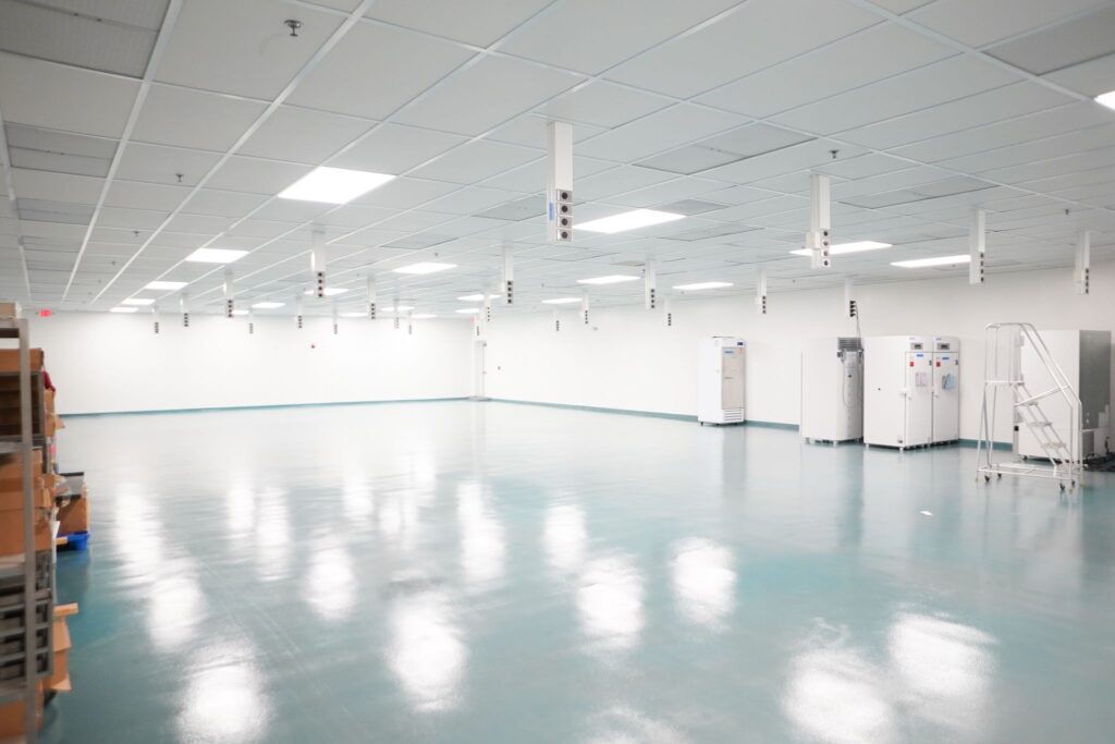 A textured, glossy, slip-resistant epoxy flooring is used in a life science facility.