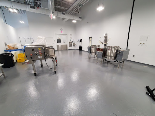 A commercial space has FDA-compliant floors for a clean and safe work environment.
