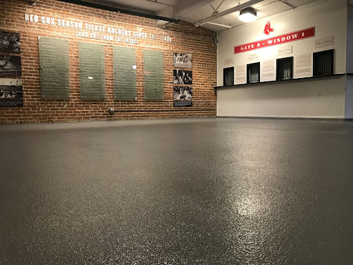 A restaurant interior features brown and cream metallic epoxy flooring that adds visual interest and slip resistance.